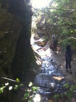 Walking to the lip of the waterfall