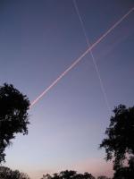 Sunset contrails at San Antonio Lake